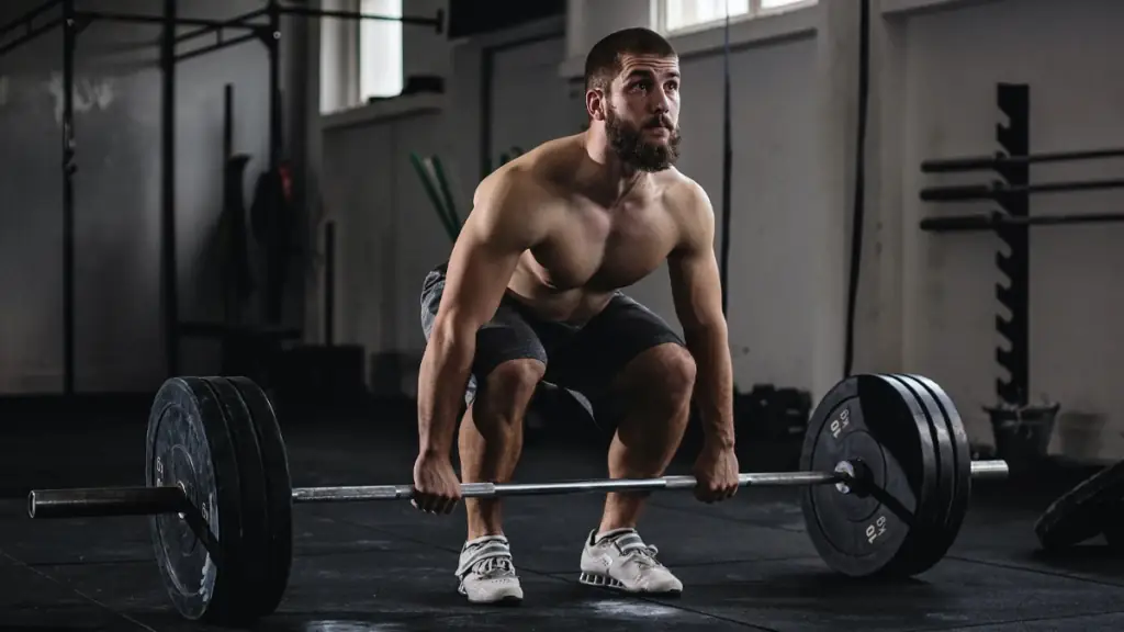 5 Signs You Can Actually Lift More Weight than You Think Athlete deadlifting