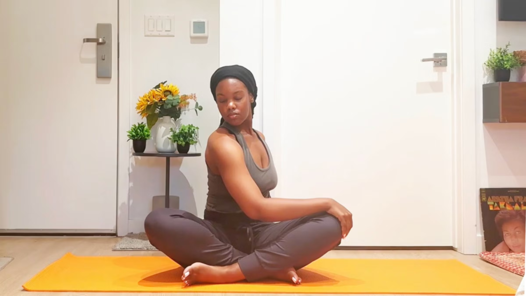 Ramoni Overton practicing yoga for neck pain.