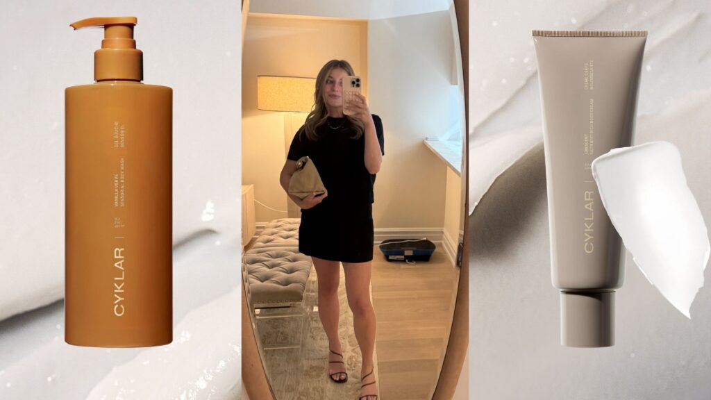 samantha holender in a black outfit taking a mirror selfie next to a bottle of cyklar lotion