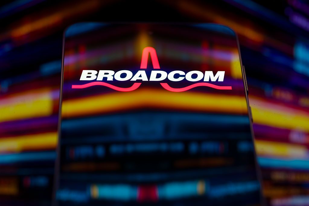 Broadcom Can’t Cap Dow’s 874-Point Bounce: Stock Market Today Broadcom logo displayed on a smartphone screen